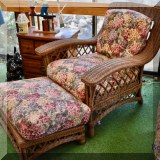 F66. Wicker chair and ottoman. 